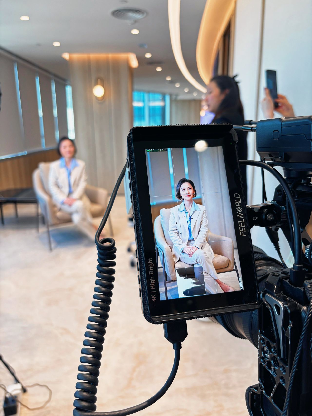 Behind the scenes of Jessie Chiu filming an FWD campaign