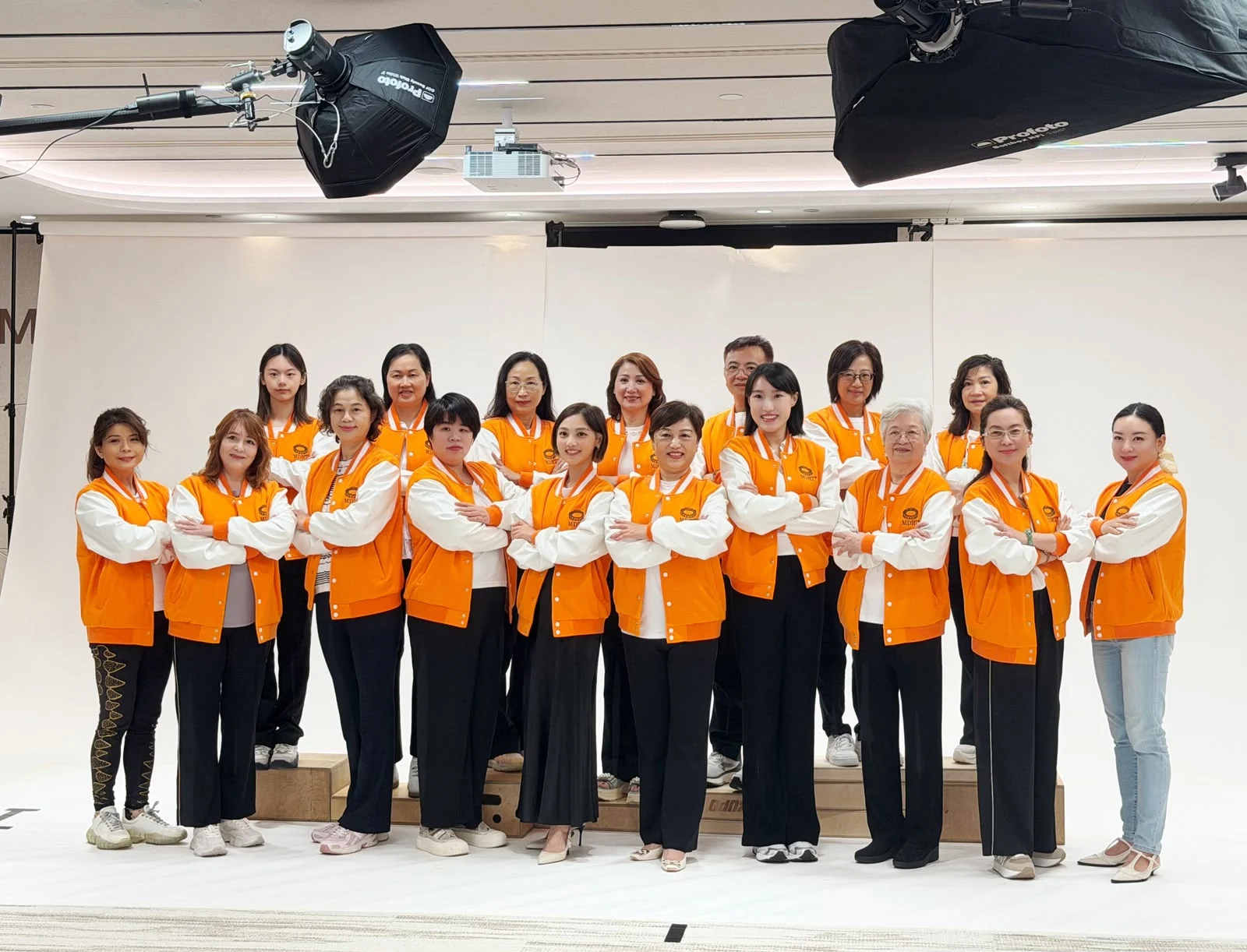 Jessie Chiu with members of her agency team during a team photography session